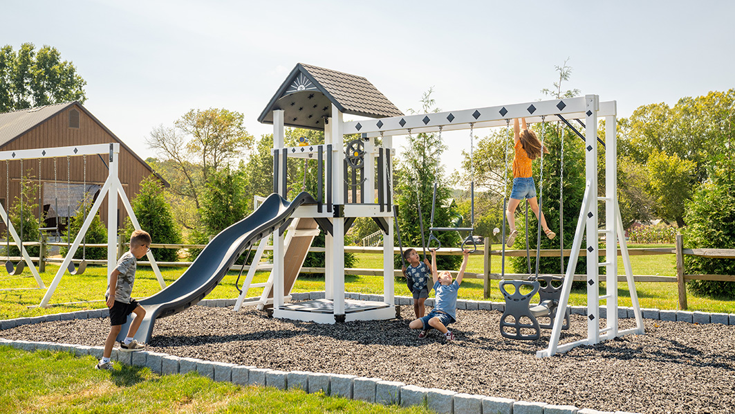 Vinyl Swing Sets VS Wood Swing Sets VS Metal Swing Sets