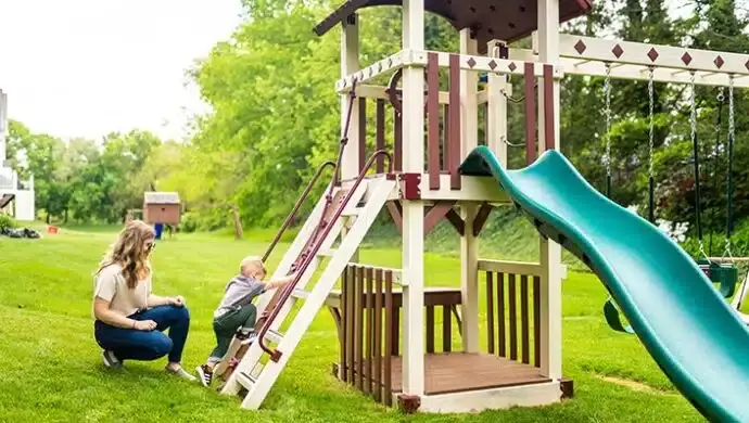 Comparing Vinyl Swing Sets to Wood Playsets